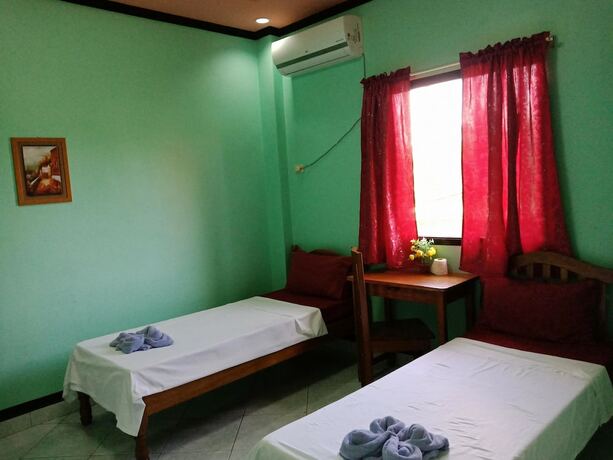 Imagen de la habitación del Hotel Tojo Inn. Foto 15