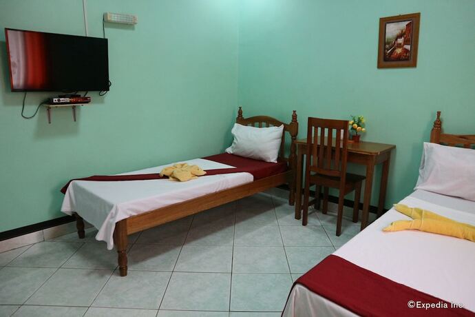 Imagen de la habitación del Hotel Tojo Inn. Foto 19