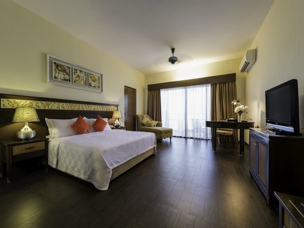 Imagen de la habitación del Hotel Tok Aman Bali Beach Resort. Foto 12