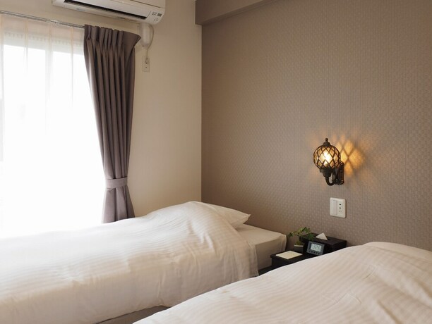 Imagen de la habitación del Hotel Toki no Yado Naha by Sunrest Resort. Foto 39