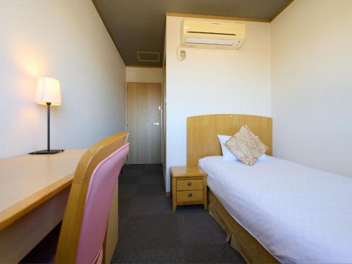 Imagen de la habitación del Hotel Toko. Foto 11