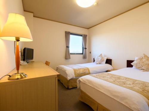 Imagen de la habitación del Hotel Toko. Foto 12