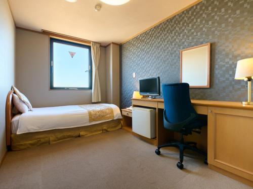 Imagen de la habitación del Hotel Toko. Foto 15