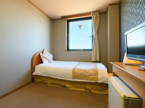 Imagen de la habitación del Hotel Toko. Foto 16