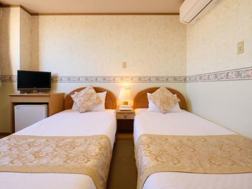 Imagen de la habitación del Hotel Toko. Foto 17