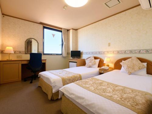 Imagen de la habitación del Hotel Toko. Foto 18