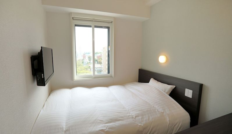 Imagen de la habitación del Hotel Tokyo City View Tabata Station. Foto 13