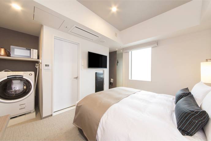Imagen de la habitación del Hotel Tokyu Stay Ginza. Foto 4