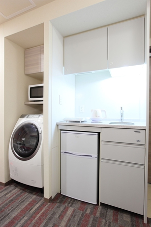 Imagen de la habitación del Hotel Tokyu Stay Ikebukuro. Foto 8