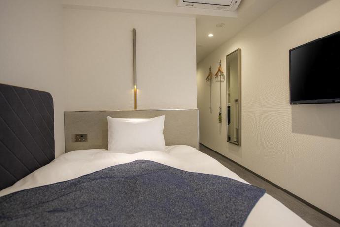 Imagen de la habitación del Hotel Tokyu Stay Osakahonmachi. Foto 5