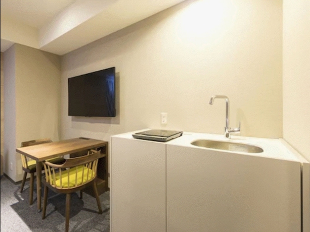 Imagen de la habitación del Hotel Tokyu Stay Sapporo. Foto 9