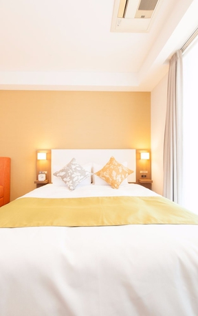 Imagen de la habitación del Hotel Tokyu Stay Yoga. Foto 11