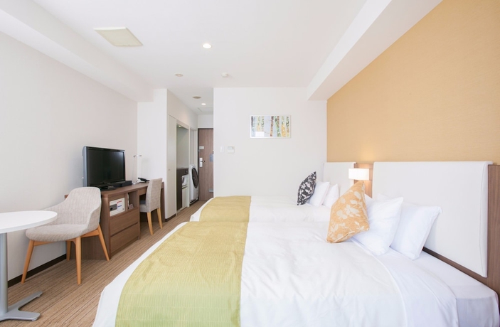 Imagen de la habitación del Hotel Tokyu Stay Yoga. Foto 14