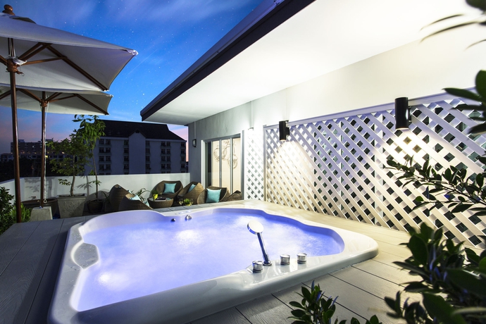 Imagen de los exteriores del Hotel Tolani Nimman Villa Chiang Mai. Foto 10