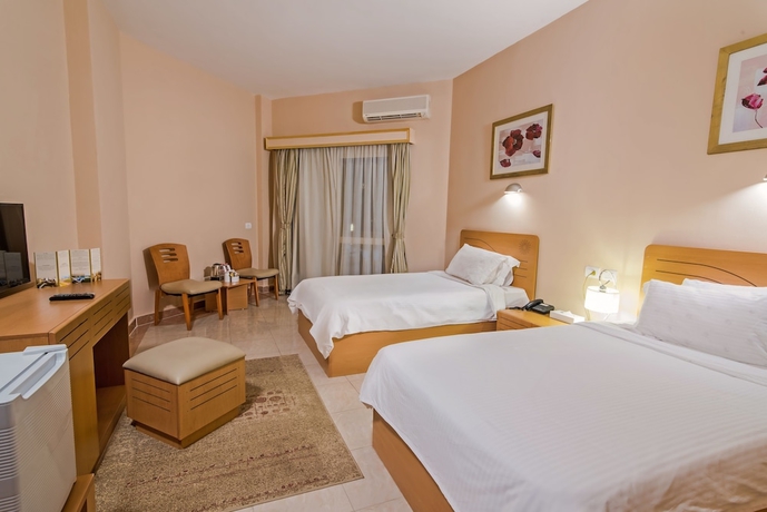 Imagen de la habitación del Hotel Tolip Family Club Borg El Arab. Foto 10