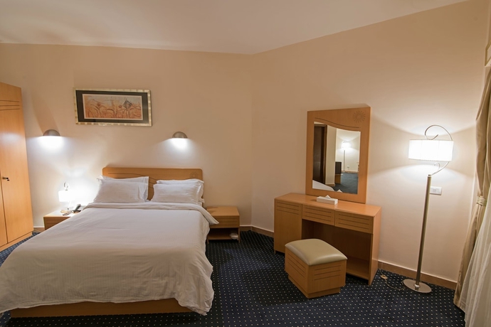 Imagen de la habitación del Hotel Tolip Family Club Borg El Arab. Foto 11