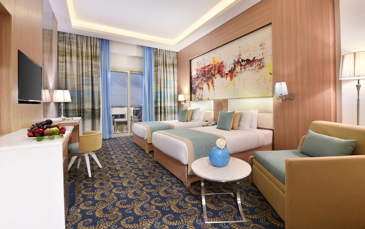 Imagen de la habitación del Hotel Tolip Gardens. Foto 6