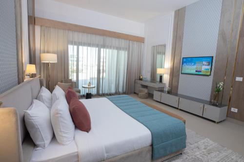 Imagen de la habitación del Hotel Tolip Olympic International City. Foto 12