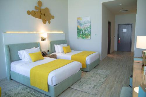 Imagen de la habitación del Hotel Tolip Olympic International City. Foto 18