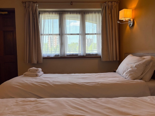 Imagen de la habitación del Hotel Tollgate. Foto 4