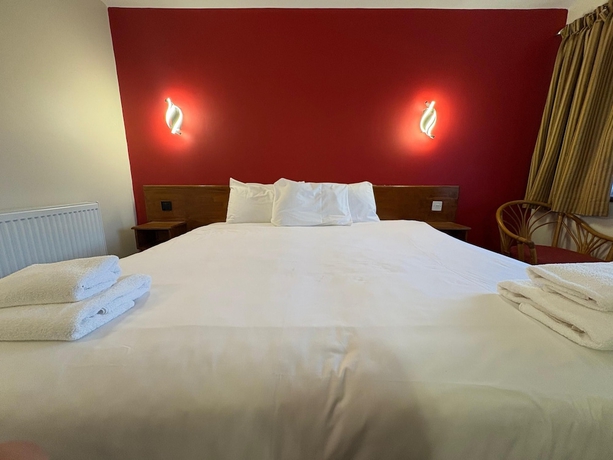 Imagen de la habitación del Hotel Tollgate. Foto 10