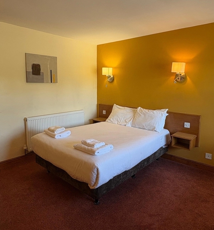 Imagen de la habitación del Hotel Tollgate. Foto 12
