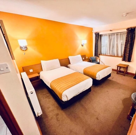 Imagen de la habitación del Hotel Tollgate. Foto 16