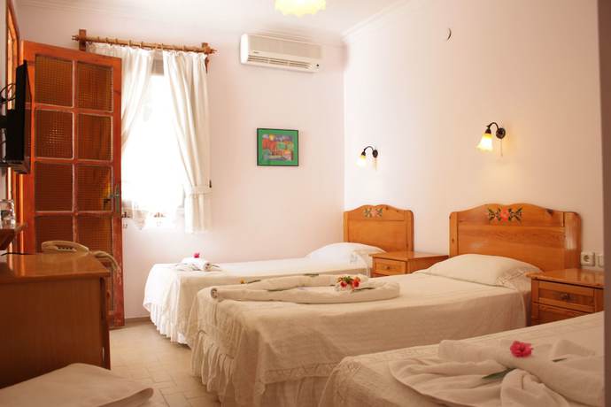 Imagen de la habitación del Hotel Toloman Bitez Beach. Foto 5