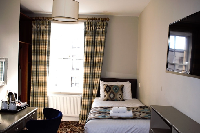 Imagen de la habitación del Hotel Tom Dick and Harriet\'s. Foto 3