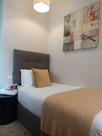 Imagen de la habitación del Hotel Tom Dick and Harriet\'s. Foto 9