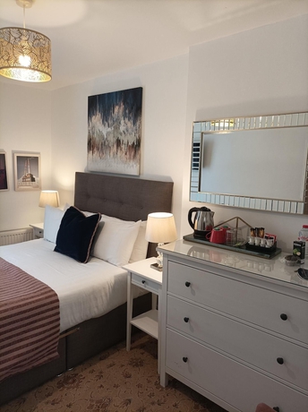 Imagen de la habitación del Hotel Tom Dick and Harriet\'s. Foto 11