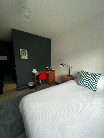 Imagen de la habitación del Hotel Tom Dick and Harriet\'s. Foto 12