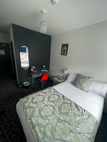 Imagen de la habitación del Hotel Tom Dick and Harriet\'s. Foto 13