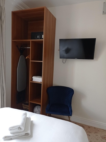 Imagen de la habitación del Hotel Tom Dick and Harriet\'s. Foto 16