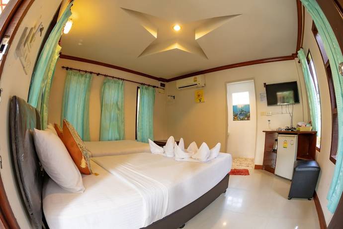 Imagen de la habitación del Hotel Tom Pizza Resort. Foto 6