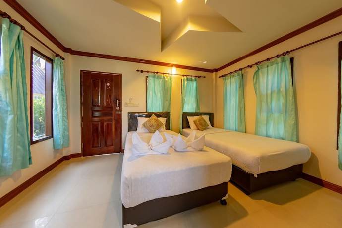 Imagen de la habitación del Hotel Tom Pizza Resort. Foto 7