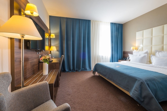 Imagen de la habitación del Hotel Tom River Plaza. Foto 4