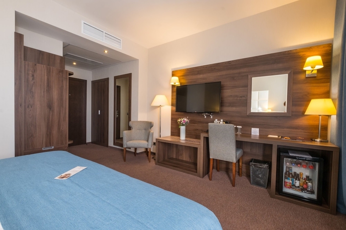 Imagen de la habitación del Hotel Tom River Plaza. Foto 7