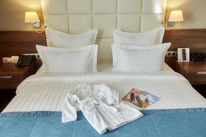 Imagen de la habitación del Hotel Tom River Plaza. Foto 8