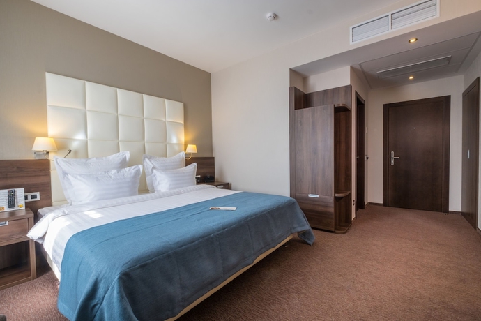 Imagen de la habitación del Hotel Tom River Plaza. Foto 11