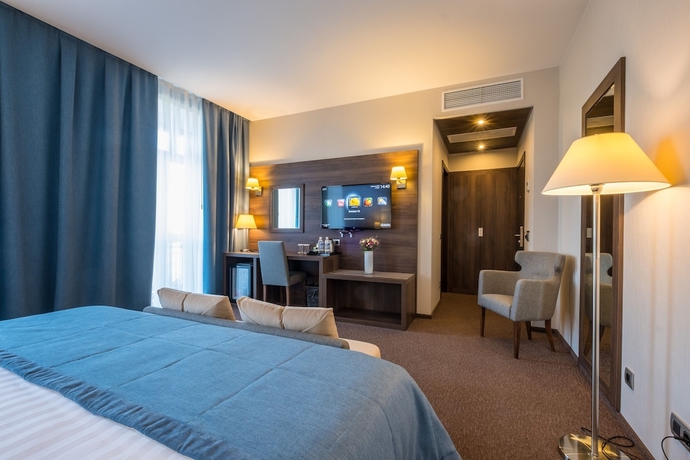 Imagen de la habitación del Hotel Tom River Plaza. Foto 14