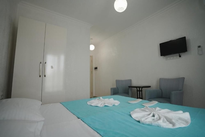Imagen de la habitación del Hotel Toma Palace. Foto 7
