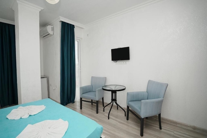 Imagen de la habitación del Hotel Toma Palace. Foto 10