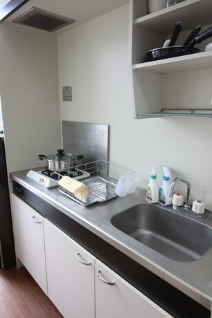 Imagen de la habitación del Hotel Tomarun Okinawa. Foto 21