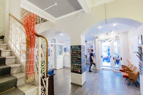 Imagen de la habitación del Hotel Tomato Backpackers. Foto 2