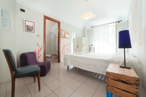 Imagen de la habitación del Hotel Tomato Backpackers. Foto 3