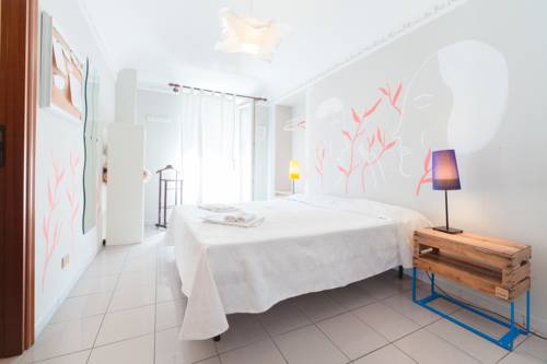 Imagen de la habitación del Hotel Tomato Backpackers. Foto 4