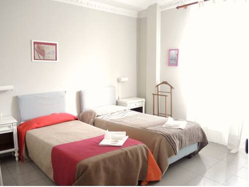 Imagen de la habitación del Hotel Tomato Backpackers. Foto 9