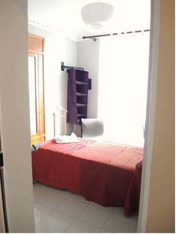 Imagen de la habitación del Hotel Tomato Backpackers. Foto 10