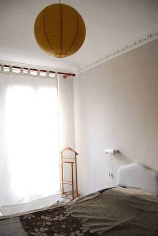 Imagen de la habitación del Hotel Tomato Backpackers. Foto 12